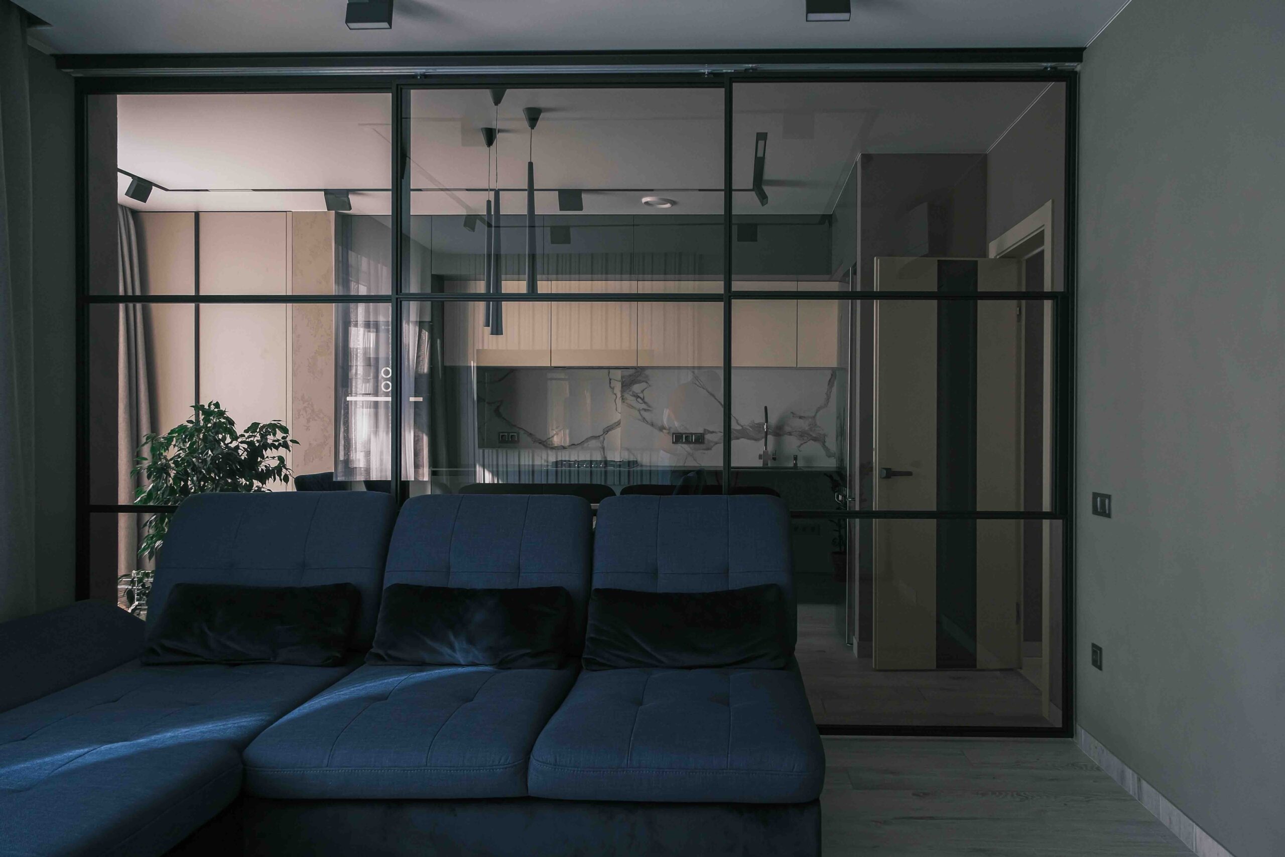 Creative Ways to Divide Your Open-Plan Living Space With Room Dividers 2 room dividers / glass partitions